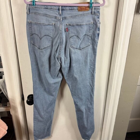 Levi's 721 High Rise Skinny Jeans. Light wash distressed with holes - Picture 6 of 7